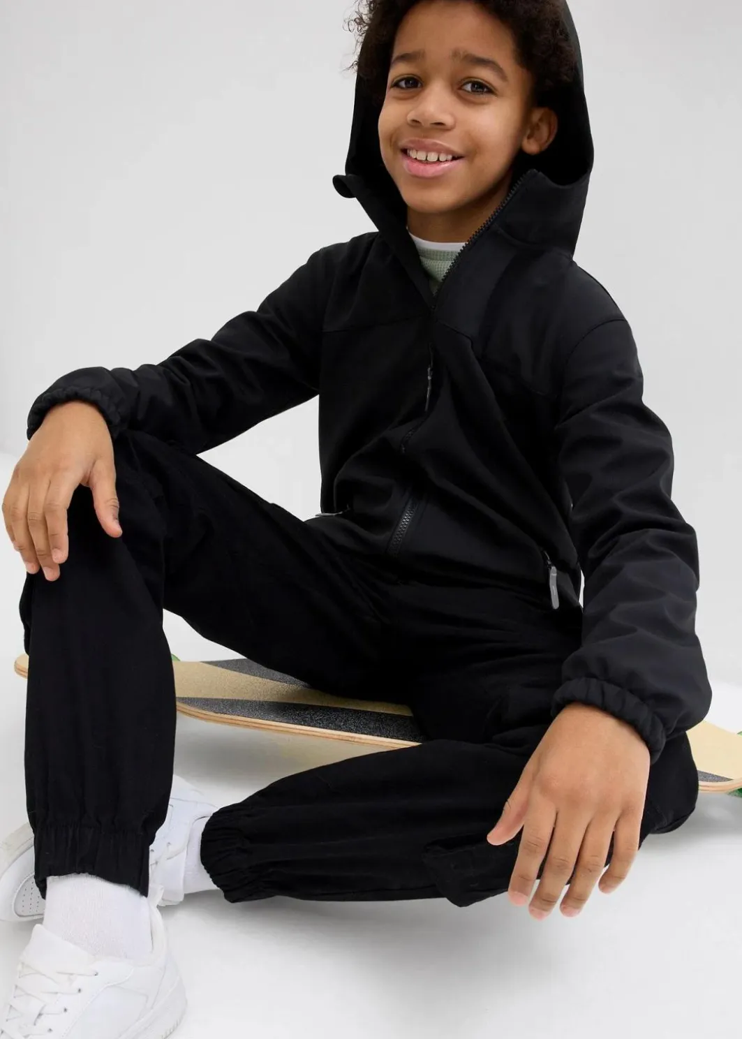 Kinder bonprix Jungen 9-16 Jahre·Jacken & Outdoor|Jungen 2-8 Jahre·Nachhaltigere Materialien|Softshelljacke mit Kapuze, wasserabweisend